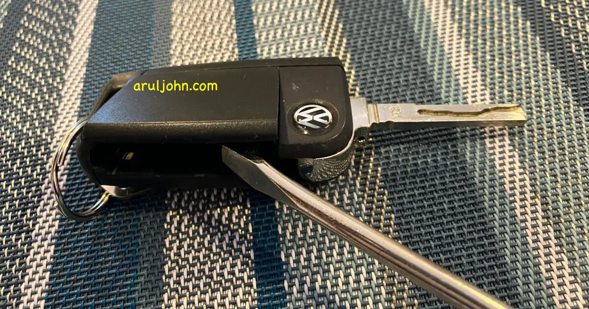 Open key fob using screwdriver